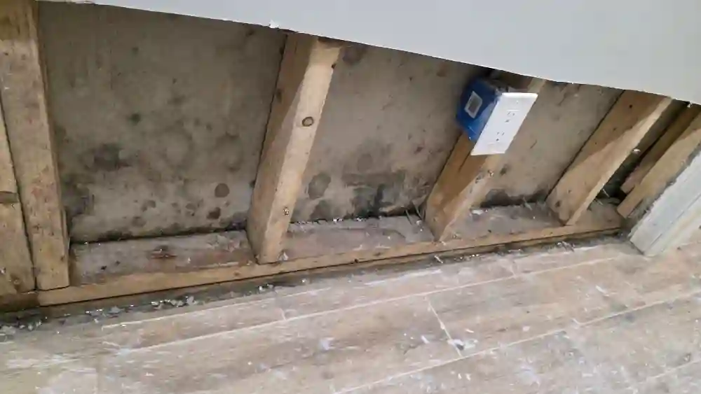 Basement flooding in Billerica after heavy rain with water damage and sump pump